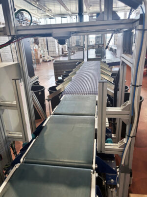nastro a tappeto per settore logistico, smistamento pacchi
